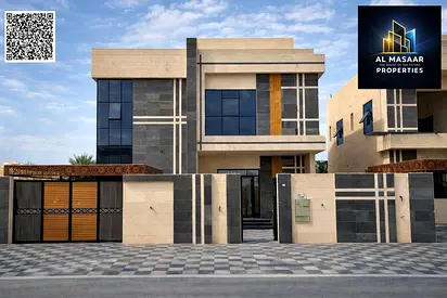 Villa for sale in Al Rawdah, two floors, roof, and external annex. Freehold ownership. Price includ