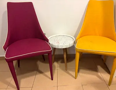Pair of modern dining/lounge chairs in yellow and magenta (used) with free side table and IKEA mirro