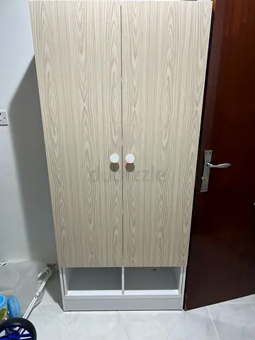 Light wood 2-door wardrobe with shelves — good condition