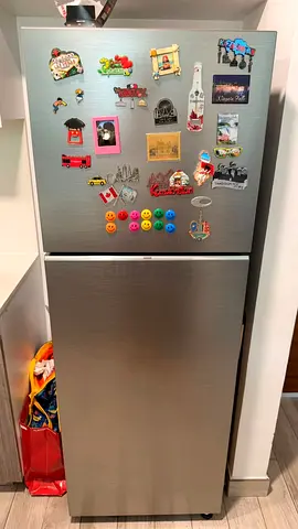 Samsung stainless steel top-freezer refrigerator - good condition