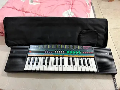 Casio SA-32 Portable 32-Key Keyboard with Soft Carry Case