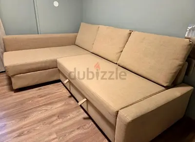 Beige L-shaped Sofa-bed with Storage — Good Condition