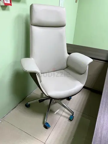 White high-back ergonomic office chair with headrest