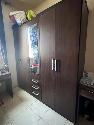 Dark Wood 3-Door Wardrobe with Mirror and Drawers - Good Condition