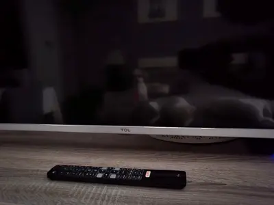 TCL 65-inch LED TV with Remote - Good Working Condition
