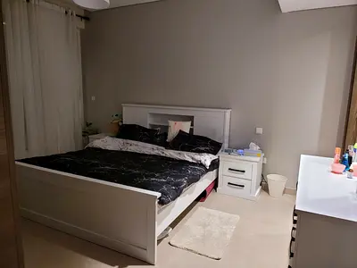 White Wooden King Bed with Headboard and Two Matching Nightstand and Dressing table