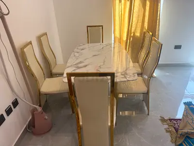 Marble-top Dining Table with 6 Gold-trimmed Chairs