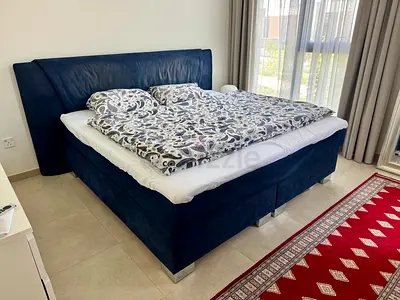 Blue upholstered box spring double bed (good condition) 2x2m . good condition