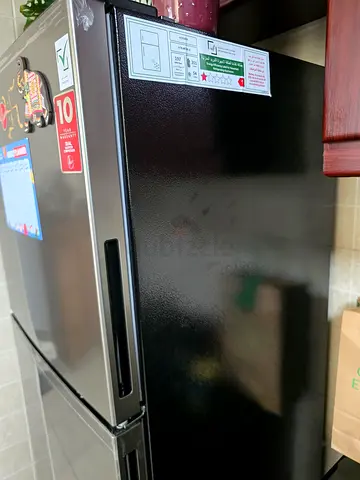 Used stainless steel double-door refrigerator - good condition