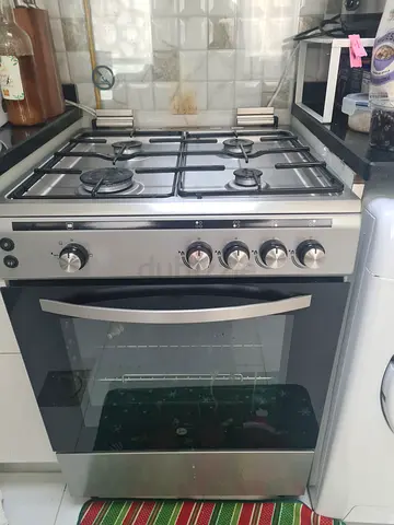 Hoover Stainless Steel 4-Burner Gas Cooker with Oven - Excellent Condition 2 Years old