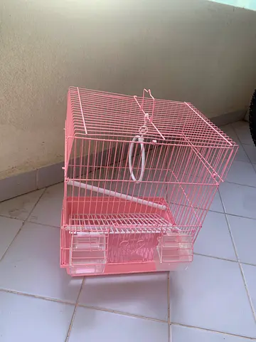 Pink metal bird cage with accessories - good condition