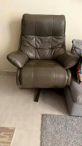 Comfortable leather recliner armchair - neutral brown