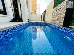 Villa for sale opposite a garden, including registration fees, electricity, water and air conditioni