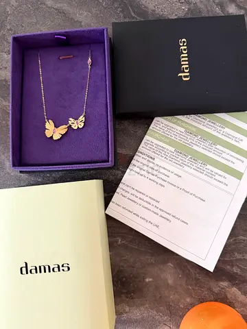Damas gold necklace 4.4 grams doubles sided
