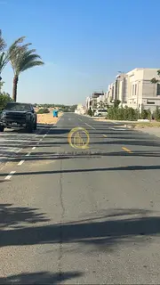 Land for sale in Al-Hawshi area, new development Area: 2745 sq ft 3-year installment plan