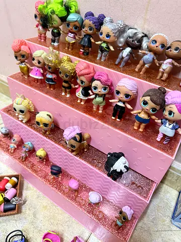 Lot of LOL Surprise Dolls with Display Stand and Accessories