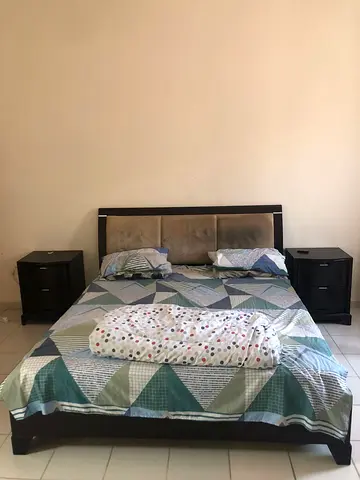 Bed with side tables matress and dresser