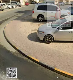For sale in Ajman: Residential/commercial corner plot on two streets, approximately 50 meters from A