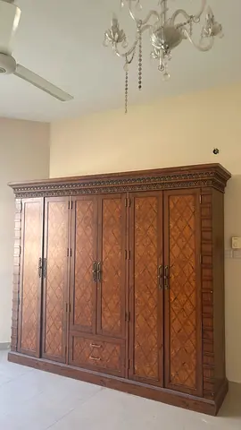 Large Solid Wood 6-Door Wardrobe with Carved Details