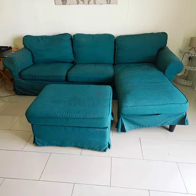 Teal 3-seater L-shaped Sofa with Ottoman - Slipcovered, fairly good condition .