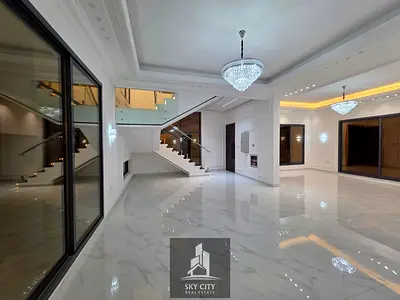 Luxury freehold villa on Sheikh Mohammed Bin Zayed Road, prime location behind Al Hamidiya Park, with swimming pool