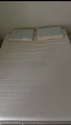 Queen size mattress with two pillows — gently used