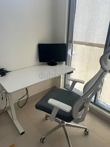 Electric Adjustable Table + Ergonomic Chair – AED 600