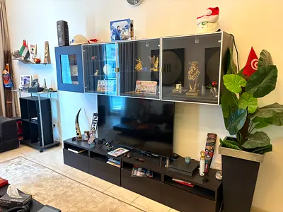 Large tv Console + lighted wall mounted cabinet