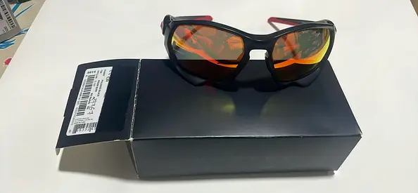 Oakley original Polarized Sport Sunglasses with Orange Mirrored Lenses never used original