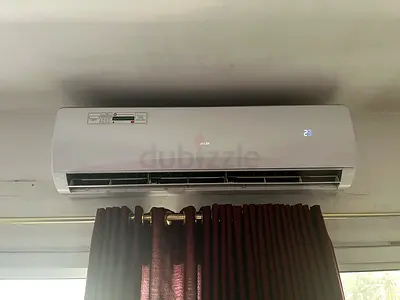Wall-mounted AUX Split Air Conditioner - Good Working Condition