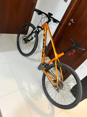Trek Marlin5-style Orange Mountain Bike - Brand new Condition ( XL )