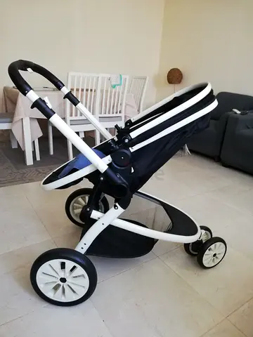 Lightweight black and white standard baby stroller - good condition