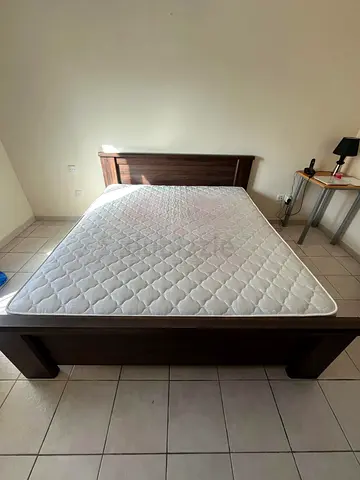 Solid wood double bed frame with mattress - good condition