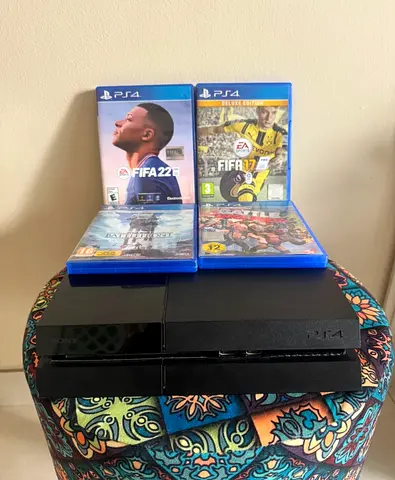 PlayStation 4 console without controller and 4 PS4 games (FIFA 22, FIFA 17, others)