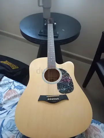 Used Acoustic-Electric Guitar with Cutaway - Natural Finish