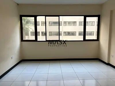 Spacious 2 Bedroom | Prime Location | Family Building