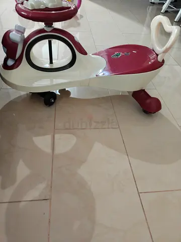 Little ride-on walker with steering handle - used