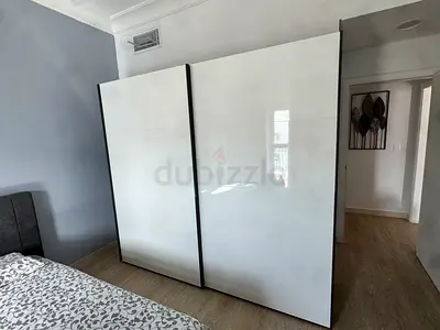 Wardrobe with sliding doors as new