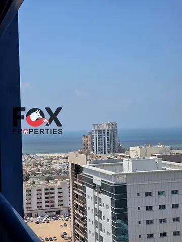 Luxury 2BR apartment in Al Nuaimiya 3, Ajman. Sea-view balcony, free parking, prime location, easy access to Dubai & Sharjah.