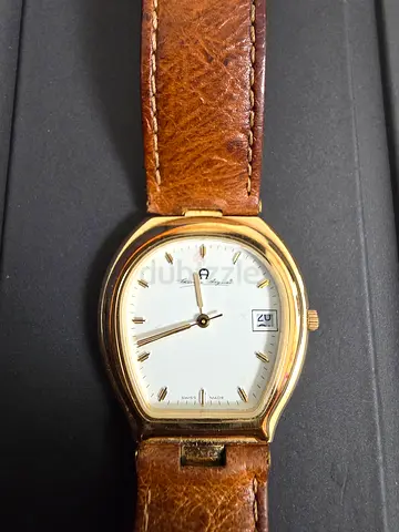 Etienne Aigner gold-tone wristwatch with brown leather strap, working date window for men or women