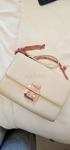 Ted Baker designer cross body bag. Blush pink rose gold.