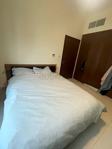 Queen bed frame with headboard - good condition