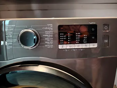 Front-load washing machine - works well, stainless finish