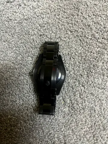 Pre-owned mens black stainless steel wristwatch (automatic)