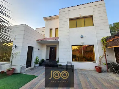 Villa in Al Rawda 1 consisting of five bedrooms, a maid's room, a living room, and a majlis, with an area of ​​5,000 sq ft
