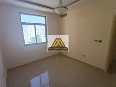 A 2-bedroom apartment with a living room for annual rent in Al Rashidiya 2 – Ajman. The apartment 