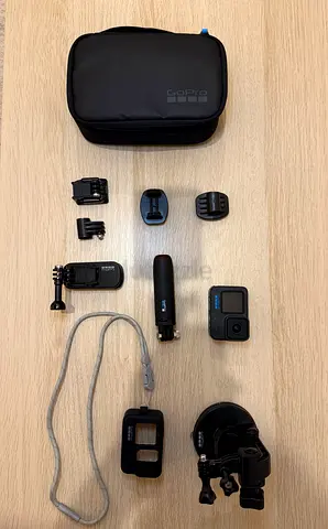 GoPro Hero 12 Black camera with Sleeve + Lanyard, Travel Kit and Suction Cup Mount - Like New