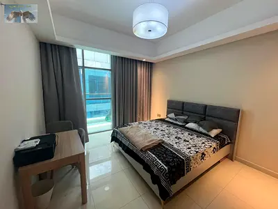 Two bedrooms and a living room for annual rent in Al Rashidiya 1, Ajman, fully furnished with parking, gym, swimming pool and children's play area