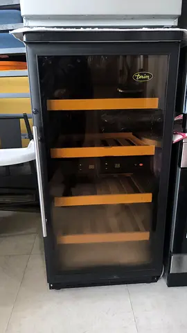 Used freestanding wine cooler / wine refrigerator with wooden shelves