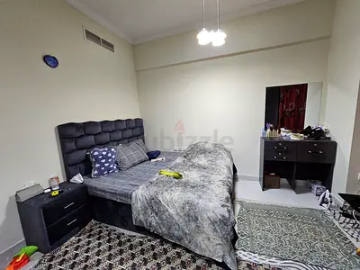 gray upholstered bed headboard